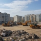 Вывоз строительного мусора бульдозерами с многоквартирных домов